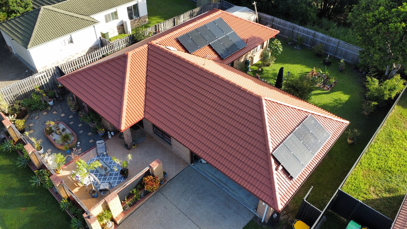 Aerial view of a restored terracotta tiled roof